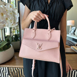 LOUIS VUITTON Lockme Leather Handbag In Baby Pink