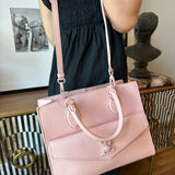 LOUIS VUITTON Lockme Leather Handbag In Baby Pink