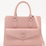 LOUIS VUITTON Lockme Leather Handbag In Baby Pink